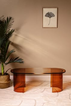 Add a touch of modern elegance with this unique ombre amber acrylic piece, featuring a smooth curved design that catches the light beautifully. Its versatile nature allows it to function as a sleek coffee table or a stylish small bench, making it perfect for any room. Pair with the Aria Acrylic Side Table for a cohesive look. Unique ombre amber acrylic Curved design Versatile piece that can be used as a coffee table or small bench Due to the dyeing process each piece may have slight color variat Bar Coffee Table, Small Table Ideas Living Room, Mid Century Modern Vintage Living Room, L Couch Table, Amber Coffee Table, Alternative To Coffee Table, Post Modern Side Table, Midcentury Modern Inspiration, Mcm Living Room Apartment