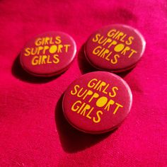 The girls support girls 25mm badge is the perfect accessory for any feminist. It features bold pink coloring and yellow text that reads "GIRLS SUPPORT GIRLS" to make a statement. Measuring 25mm in diameter, this badge is a subtle yet powerful way to show your support for girls everywhere. Wear it on your jacket, backpack, or anywhere else you want to make a statement about the importance of supporting one another. This badge is the perfect addition to any accessories collection. Feminist Gifts Shop, Feminist Patches Punk, Feminist Slogan, Feminist Patch, Pink Coloring, Feminist Enamel Pins, Girls Support Girls, Girl Reading, Accessories Collection