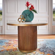 a vase with flowers on top of it sitting on a table in front of a window