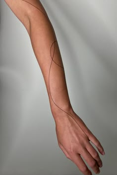 a person's arm with lines drawn on it