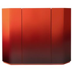 an orange and red cabinet with three doors