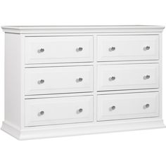 a white dresser with six drawers and two doors