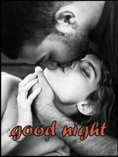 a man kissing a woman's face with the words good night written on it