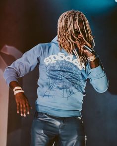 Young Thug wearing Prada Black Runway Sunglasses, Spider Worldwide Websuit Blue Hoodie, Prada Blue Leather Trousers, Nike Sb Dunk Low Club 58 Gulf Sneakers. Young Thug Fashion, Thug Fashion, Black Runway, Spider Worldwide, Clothing Board, Nike Sb Dunk Low, Sb Dunk Low, Nike Sb Dunk, Young Thug