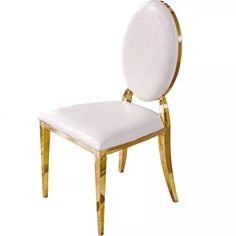 a white chair with gold trim and a white seat cushion on the back of it