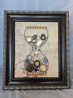 The hour glass filled with watch faces, both antiquated and modern, remind us how precious time really is.  A necklace chain forms the hourglass while watch bands adorn the top and bottom which encompass watch components and gems. This multi-media piece can stand alone or can be hung. Vintage Skeleton Dial Jewelry As Gift, Antique Gold Steampunk Jewelry As Gift, Antique Self-winding Pocket Watch As Gift, Victorian Gold Self-winding Watch, Victorian Self-winding Pocket Watch Collectible, Hour Glass, Deer Park, Watch Faces, Necklace Chain