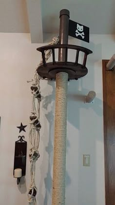 there is a cat scratching post in the room