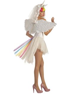 a woman in a white dress with rainbow hair and wings on her head is posing for the camera