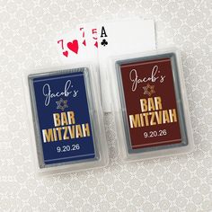 two personalized playing cards in plastic cases