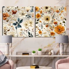 three floral paintings on a wall in a living room