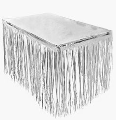 a white table cloth with fringes on it