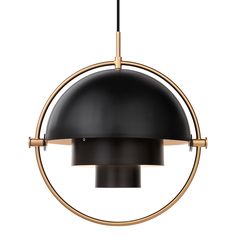 a black and gold pendant light hanging from a metal rod with an oval design on it