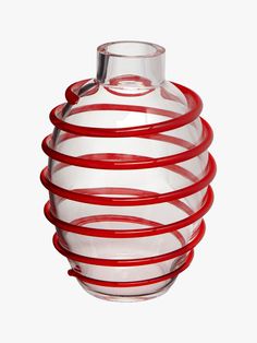 Glass vase with a spiral red detail.