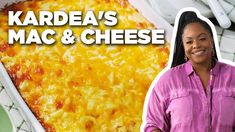 a woman standing in front of a cheese covered dish with the words kardaa's mac and cheese on it