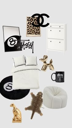 a bedroom with black and white decor on the walls, bedding, rugs, and other items