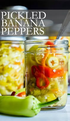 pickled banana peppers in a mason jar with spoon