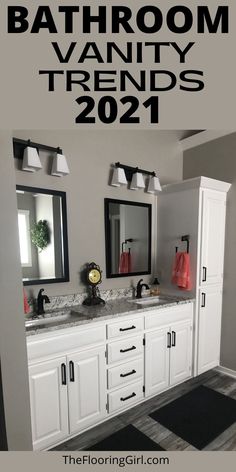 a bathroom vanity with two sinks and mirrors