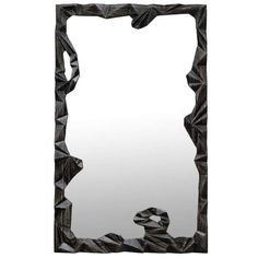 a mirror that has some kind of design on it