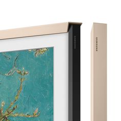 an image of a painting on the wall next to a box frame with it's lid open