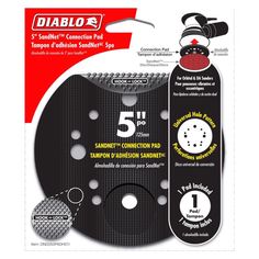 the 5 in 1 combination sanding pad is black and has five holes on it