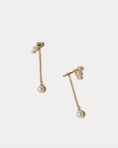 You save $60 and get free shipping with this set. An Earring Capsule perfectly curated with modern pearls. This 4-piece set includes: Petite Pearl Studs Pearl Duo Ear Jackets Pearl Chain Ear Jackets Ball Stud Earringsthe 14K gold hue and the shape of these studs pair perfectly with pearls Prefer to build you own? Customize your set here. Each piece is custom cast in 14K gold vermeil - a thick 14K gold layer on sterling silver Made with recycled precious metals. Set with freshwater pearls. All ea Stack Earrings, Custom Cast, Womens Jewelry Trends, Ear Jacket, Pearl Set, Pearl Chain, Pearl Studs, Wedding Earrings, Build Your Own