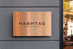 a sign on the side of a building that says hashtag