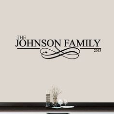 the johnson family 2013 wall decal is shown in black and white, with an elegant