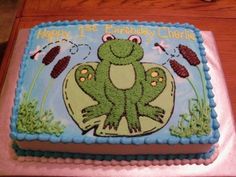 a birthday cake with a frog on it