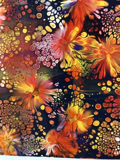 an abstract painting with orange and yellow flowers