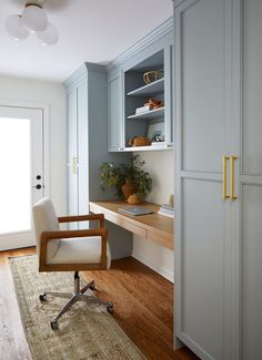 a chair sits in front of a wooden desk