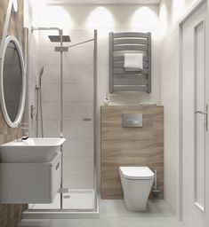 a bathroom with a toilet, sink and shower