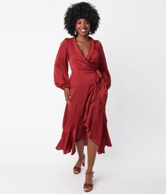 Simply divine, darlings! This sensational wrap dress is crafted in a deep burgundy woven fabric. The sultry wrap design is cinched with attached ties and creating a surplice neckline that is framed by the billowing long sleeve silhouette complete with elastic cuffs. The seamed high waist cascades into a sweeping midi length silhouette accented with a ruffled hem!Available in sizes S-L while supplies last. Fall Midi-length Wrap Dress, Burgundy Satin Wrap Dress, Flirty V-neck Wrap Dress With Ruffles, Fitted Red V-neck Wrap Dress, Viscose Midi-length Wrap Dress, Burgundy Weave, Pretty Lace Dresses, Wine Wrap, Ruffle Wrap Dress