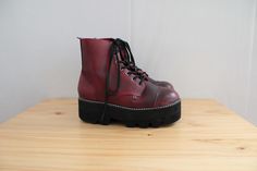 vintage awesome y3k grunge Gothic style skinny faux leather platform booties in mahogany red color. textured black platform soles. black lacing. Made by TUK Circa 2000s Measurements: (unmarked size but feels like Size US 8, Euro 38, 38.5) 11.5" sole length 4" sole width 2.5" platform 9" height In excellent condition! Gothic Platform Boots, Boots Grunge, Red Boots, Black Platform, Gothic Style, Platform Boots, Gothic Fashion, Boot Shoes Women, Red Color