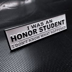 a sticker that says i was an honorary student don't know what happened