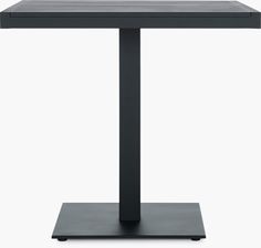 the square table is black and has a metal base