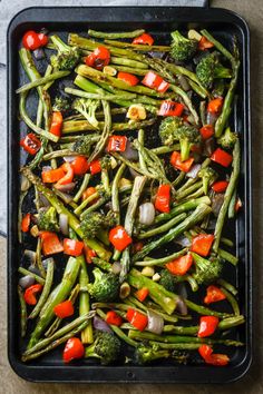 broccoli, peppers and onions in a baking dish