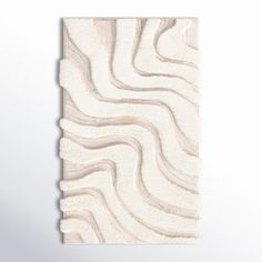 a white rug with wavy lines on the top and bottom, against a white background