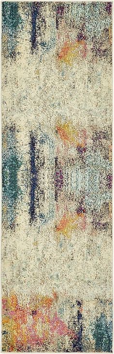 a multicolored area rug with an abstract design