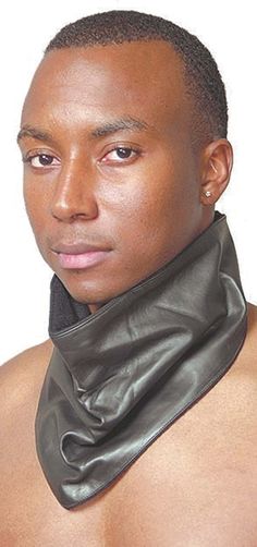 a man wearing a black leather neck gaiter with his shirt rolled up to the side