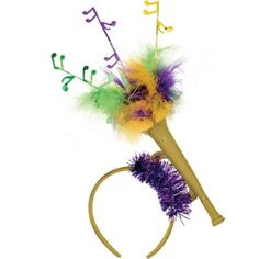 a purple and yellow flower with musical notes on it's headband, in front of a white background