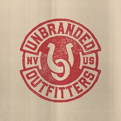 a red and white logo with the words unbreaked in it's center