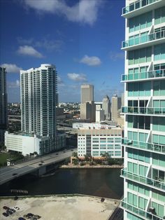 an aerial view of some buildings and the water