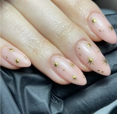 Almond Nails Gold Stars, Nude Nails With Gold Stars, Nude Almond Nails With Gold Design, Dainty Star Nails, Star Nails Almond Shape, Nye Nails Gel, Sun Inspired Nails, White Celestial Nails, Biab Gel Nails Designs