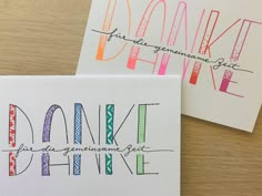 two greeting cards with handwritten words on them