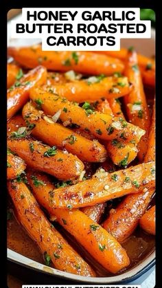 honey garlic butter roasted carrots on a plate with text overlay that reads honey garlic butter roasted carrots