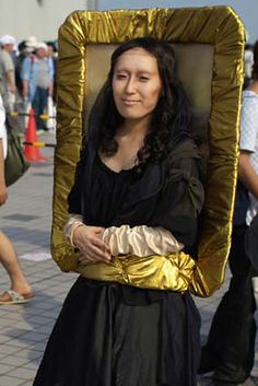 an image of a woman dressed as a golden chair with her arms crossed and head in the shape of a rectangle