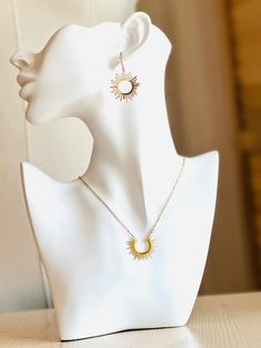 The Sol choker is a 18K gold palted stainless steel sun ray necklace is a perfect way to bring all the sun to your cloudy days. It is tarnish proof and waterproof. It is a perfect statement piece or layer it with a dainty choker! The chain measures 16 inches with a 2.5 inch extension chain. Shown in pictures with the Sol Earrings Handcrafted in the USA All BluEyed Horse Jewelry items come beautifully wrapped, perfect for gift giving! Dainty Sun Design Jewelry For Everyday, Sun Earring, Sun Jewelry, Venus Fashion, Sun Earrings, Sun Necklace, Dainty Choker, Horse Jewelry, Ring Bracelet