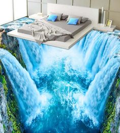 a bed room with a large painting on the floor and water flowing down it's sides