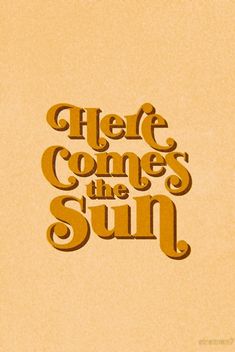 the words here comes the sun are made out of cutout paper on a beige background