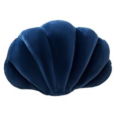 a blue scallop pillow on a white background